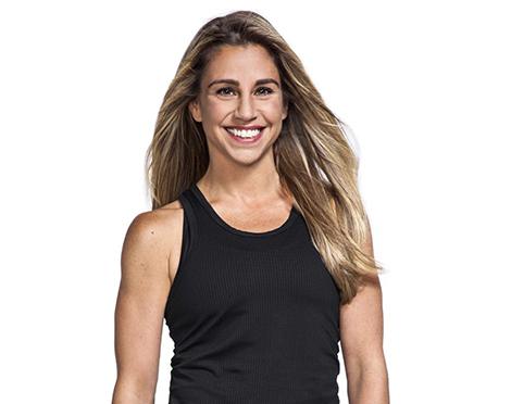 Headshot of instructor Alycia Stevenin in black tank top smiling on white background