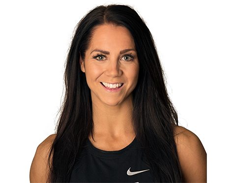 Headshot of Barry's Bootcamp instructor Amanda Larsson wearing a black tank top against a white background.
