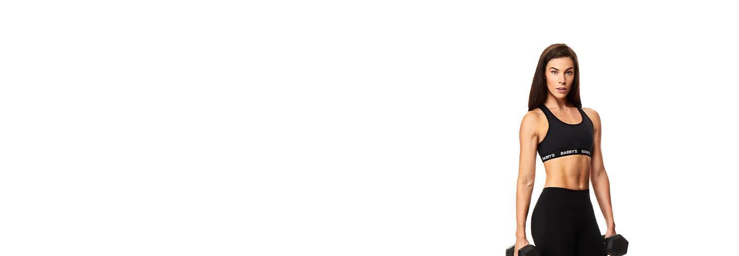 Instructor Brady Dougherty in black Barry's Bootcamp sports bra on white background