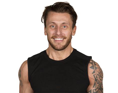 barry's instructor Christian Lawley wearing black tank