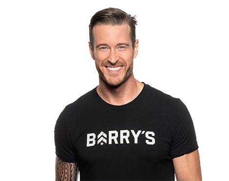 Headshot of Barry's Bootcamp instructor Dan Cook wearing a black Barry's t-shirt.