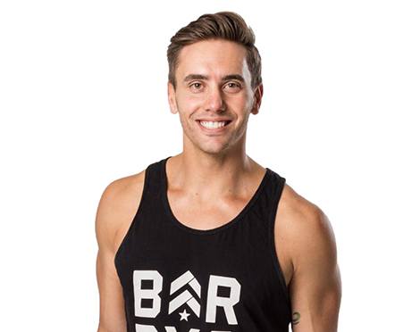 Barry's instructor Derek DeGrazio wearing a black tank top
