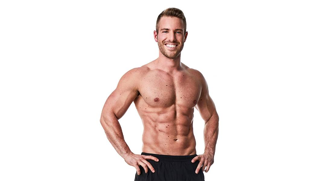 Barry's instructor Josey Greenwell shirtless posing with hands on hips