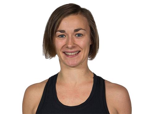 Headshot of instructor Katariina Kivekäs in black tank top smiling on white background