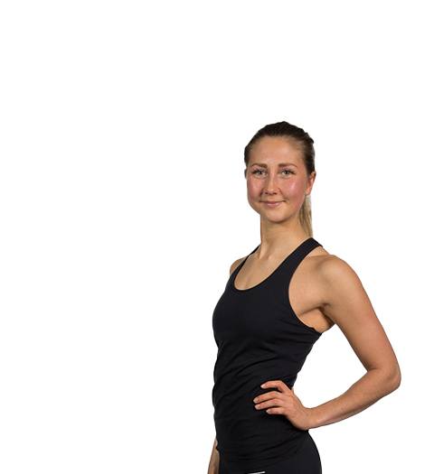 Barry's Instructor Ragna Rikheim wearing black tank with hand on hip