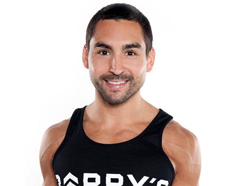 Headshot of Barry's Instructor Vince Zager wearing black Barry's tank
