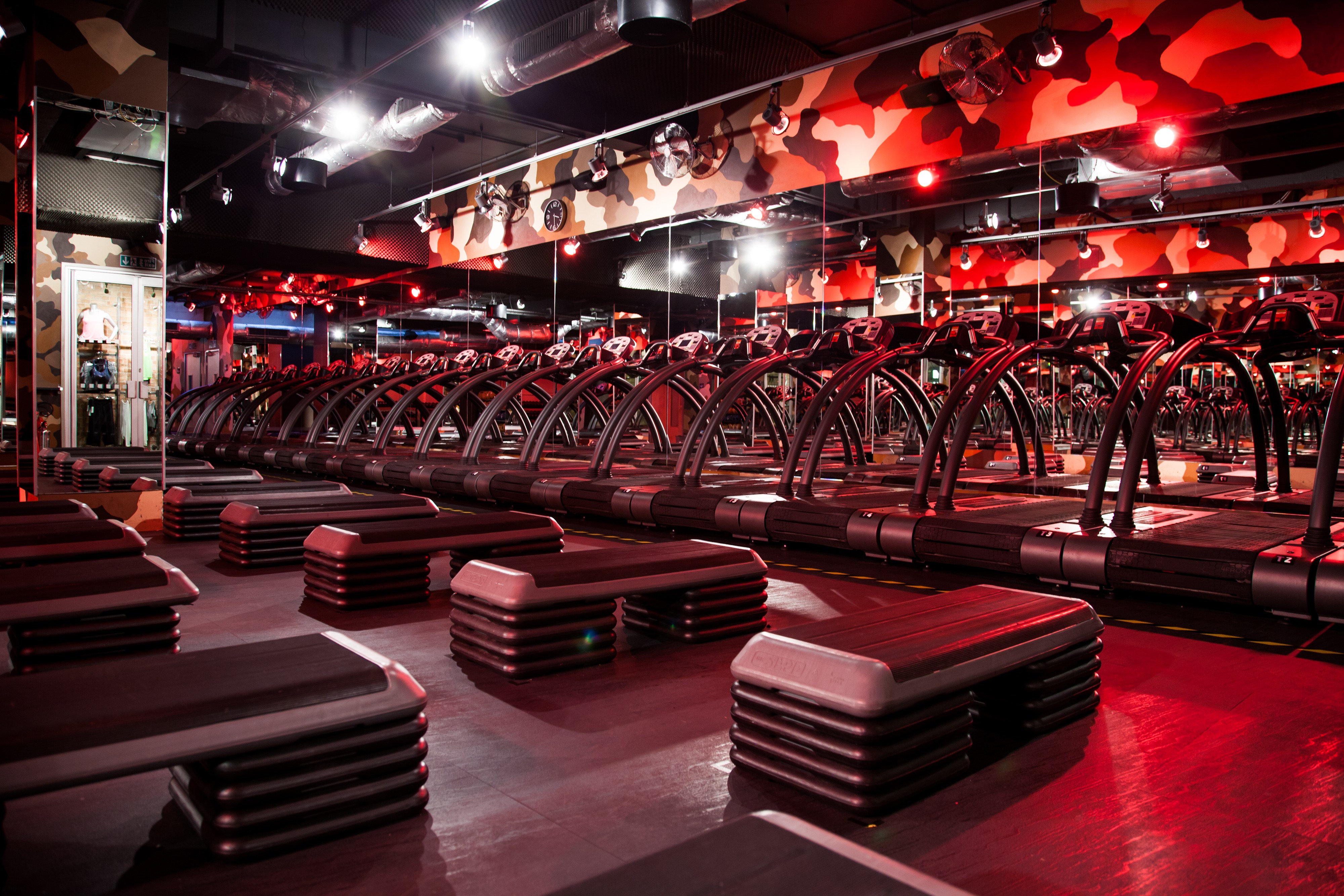 Treadmills and step boxes in Red Room at Barry's Bootcamp