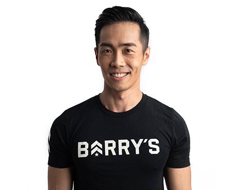 Headshot of Barry's Bootcamp instructor Jeremy Lee smiling on white background