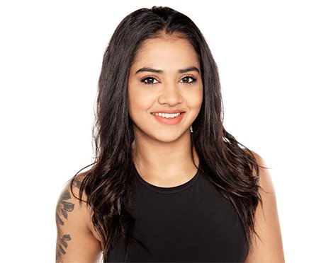 Headshot of Barry's Bootcamp instructor Trishala Poulose wearing a black tank top against a white background.
