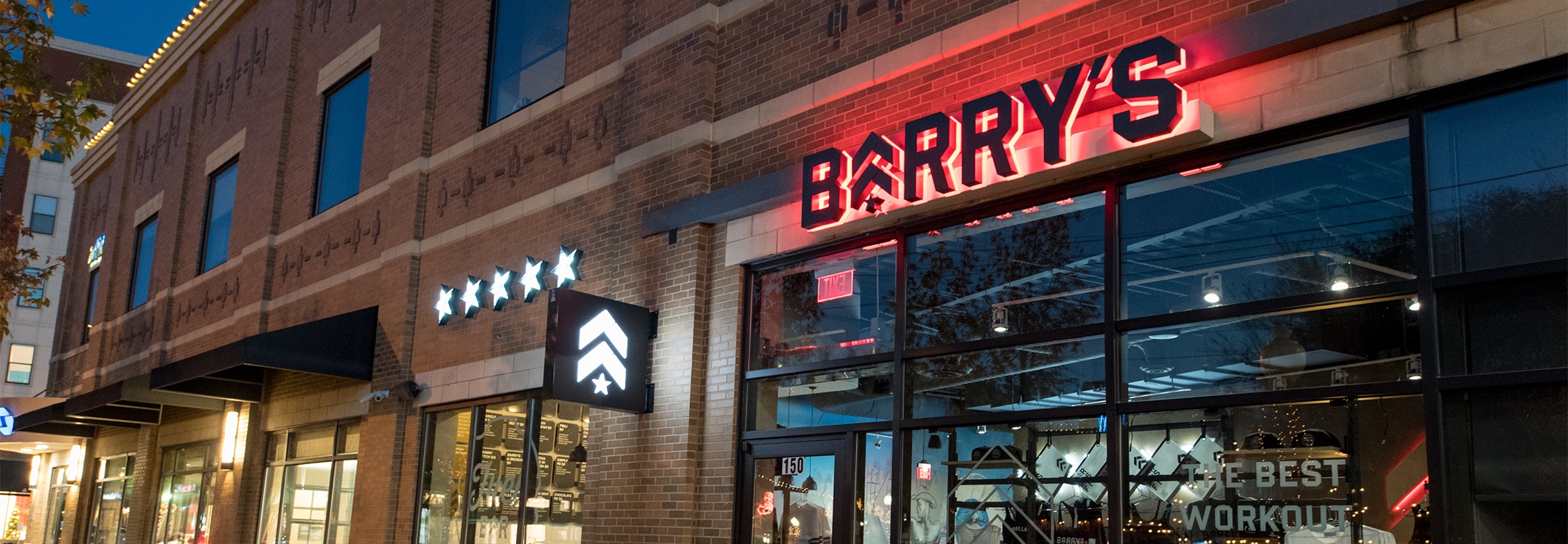 Barry's sign with red backlighting outside of Dallas studio location