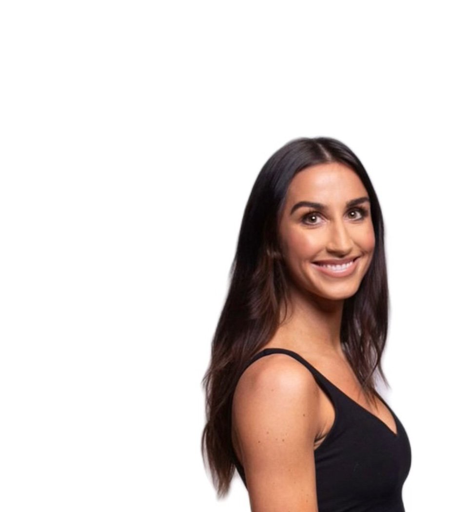 Barry's instructor standing confidently wearing a black top against a white background.