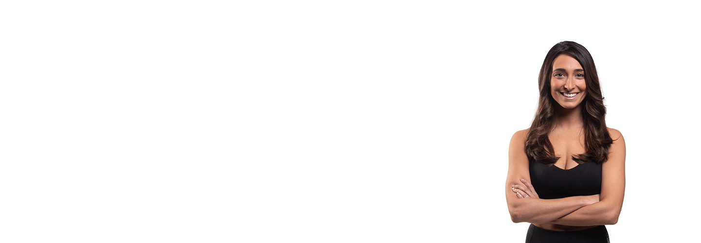 Barry's instructor standing confidently wearing a black top against a white background.