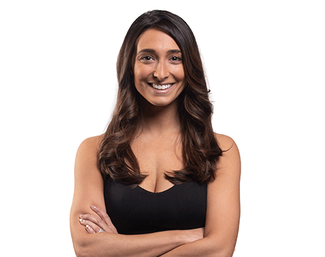 Barry's instructor standing confidently wearing a black top against a white background.