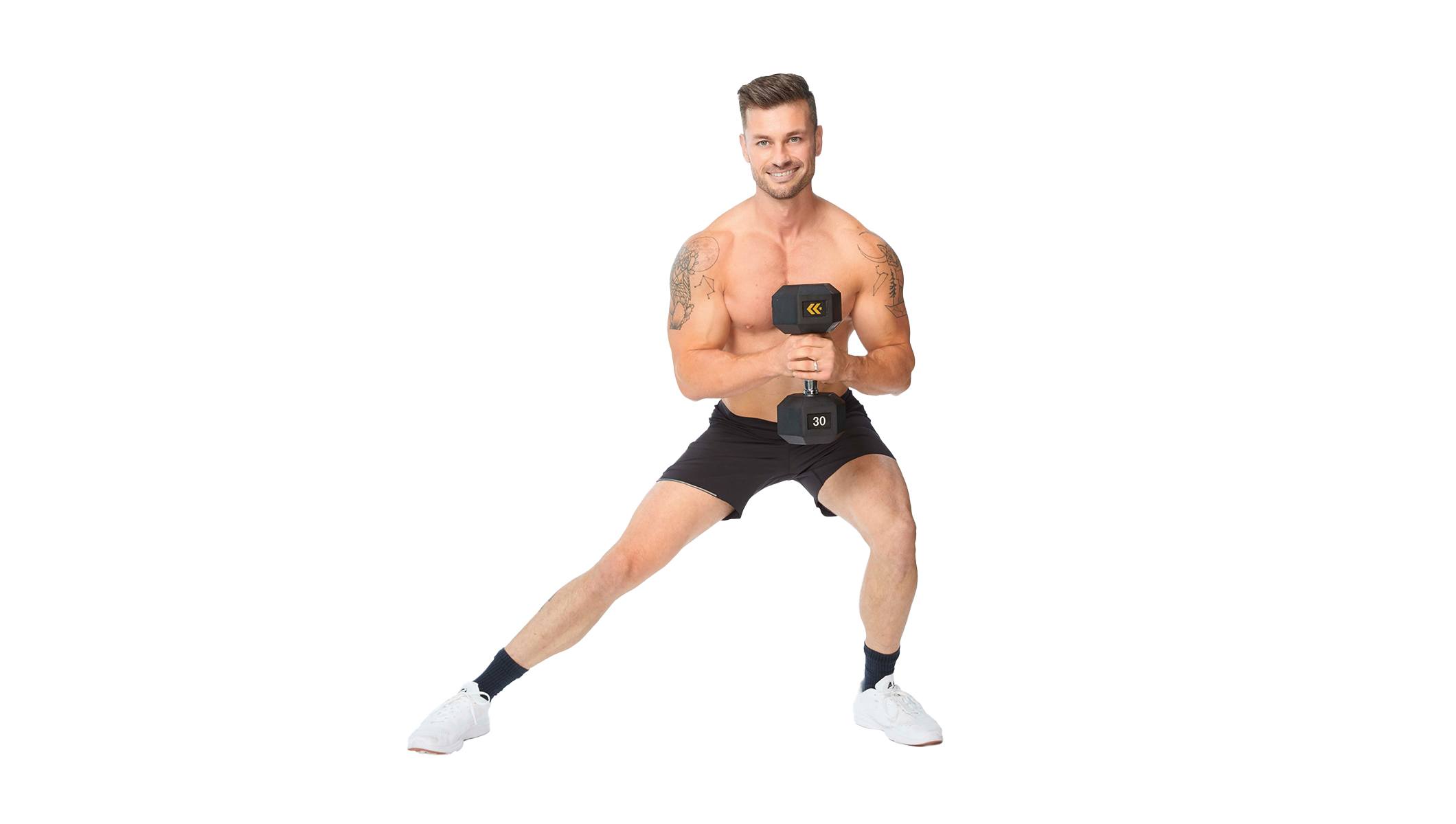 Barry's instructor doing a side lunge with a weight, wearing a black tank top against a white background, ready for the next workout challenge.