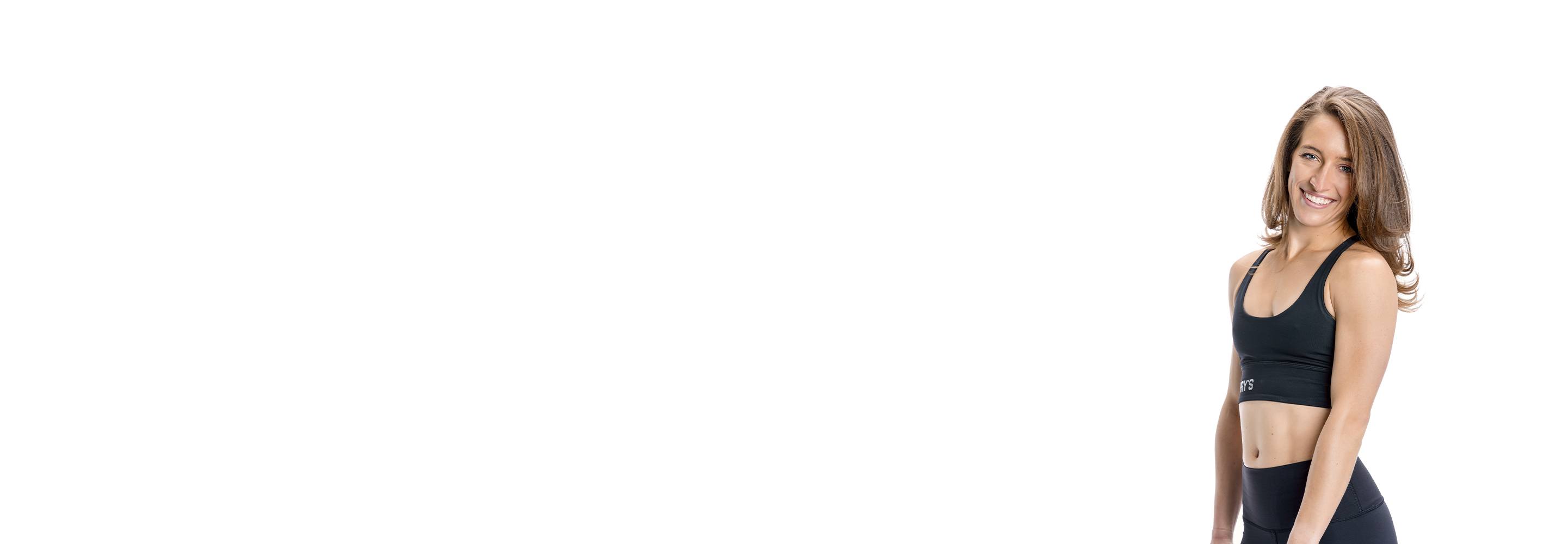 Barry's instructor standing confidently wearing a black top against a white background.