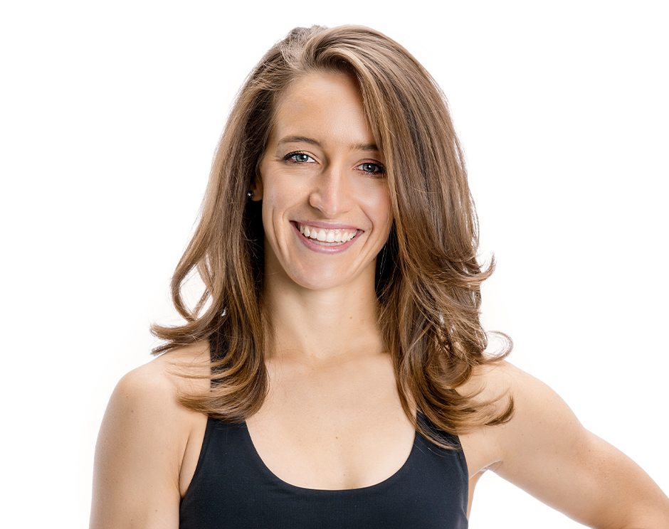 Barry's instructor standing confidently wearing a black top against a white background.