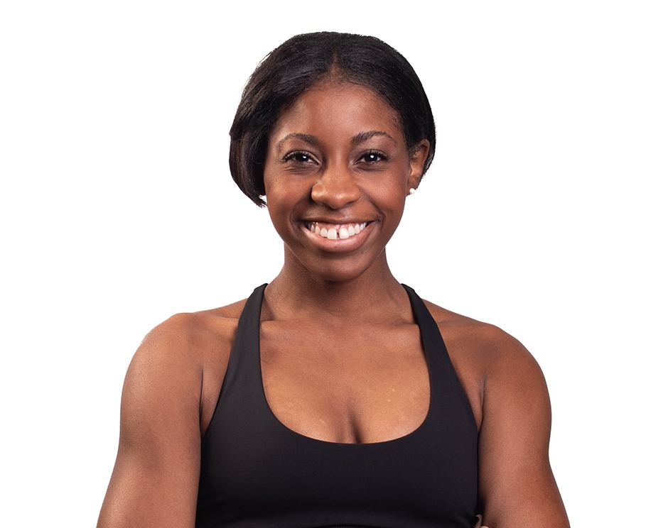 Barry's instructor standing confidently wearing a black top against a white background.