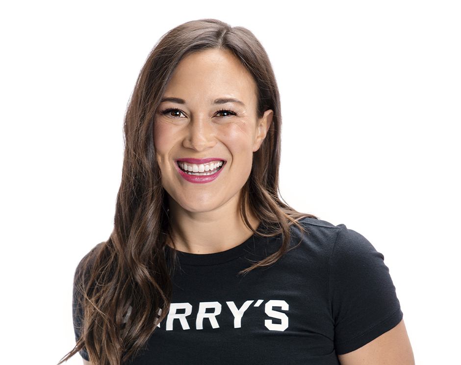 Barry's instructor standing confidently wearing a black top against a white background.