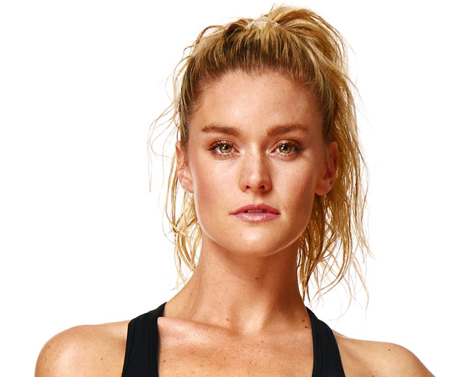 Barry's instructor standing confidently wearing a black top against a white background.