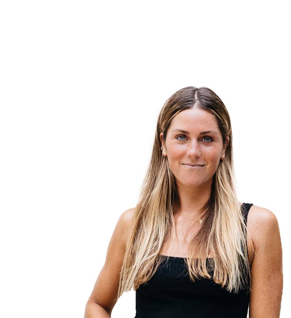 Barry's instructor standing confidently wearing a black top against a white background.