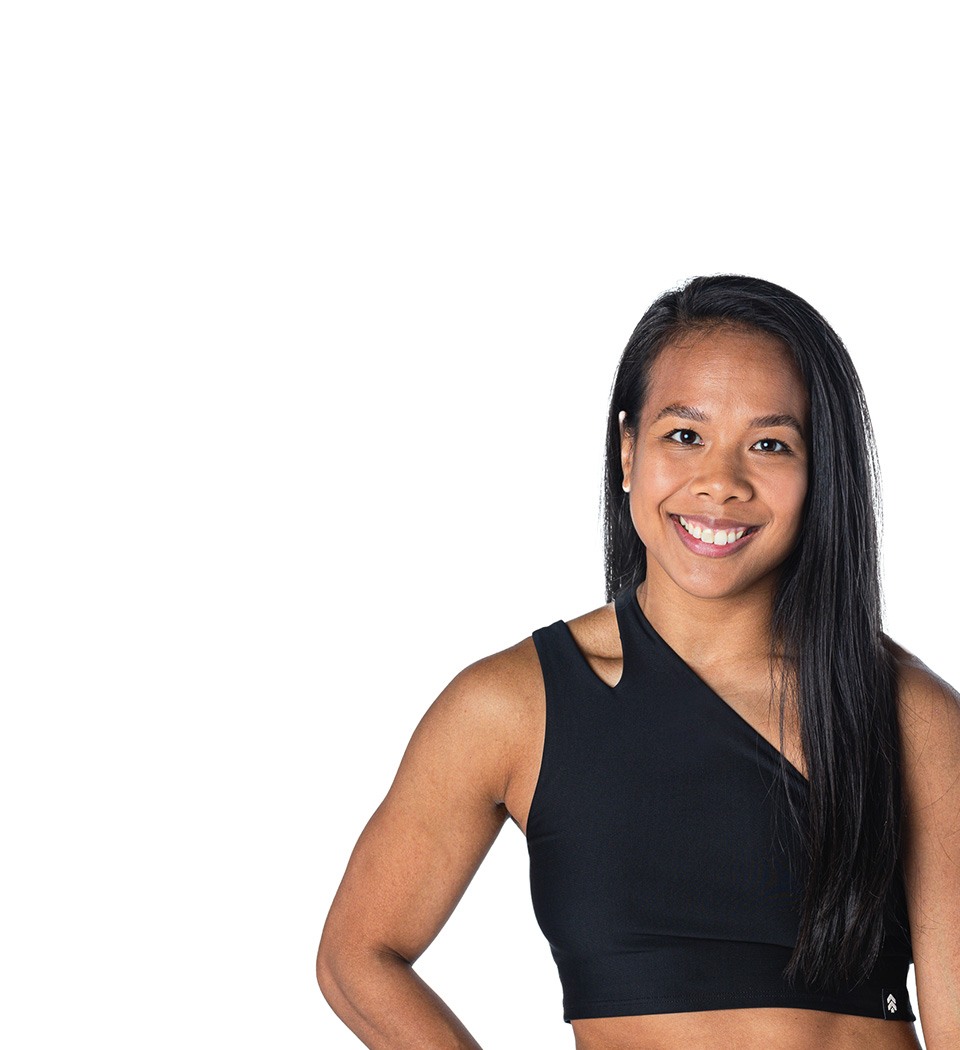 Barry's instructor standing confidently wearing a black top against a white background.