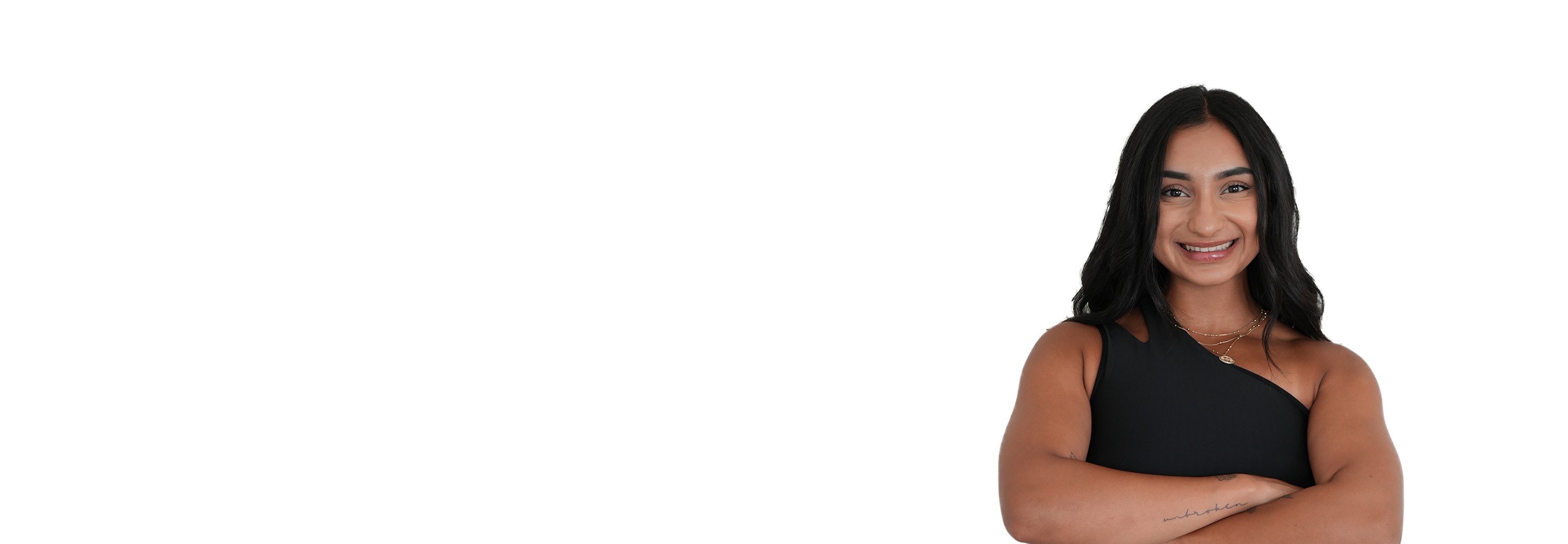 Barry's instructor standing confidently wearing a black top against a white background.