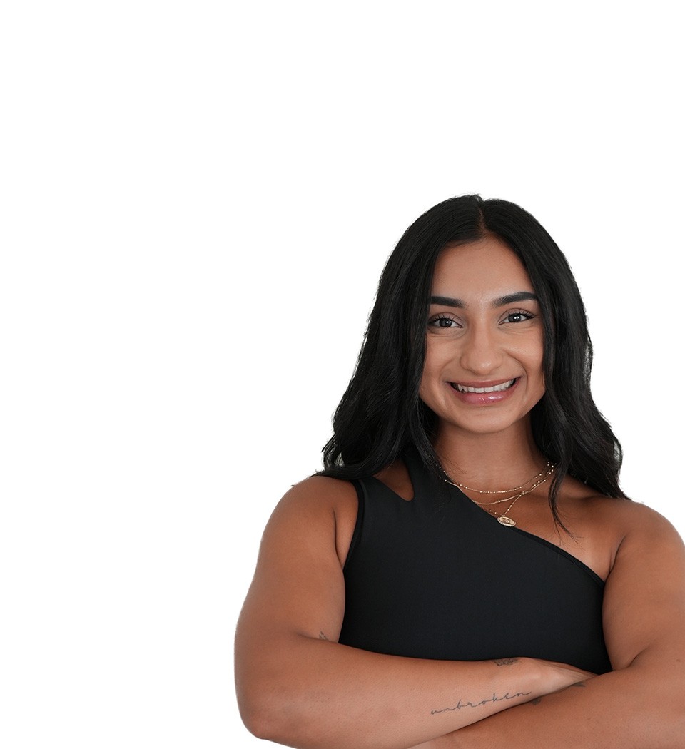 Barry's instructor standing confidently wearing a black top against a white background.