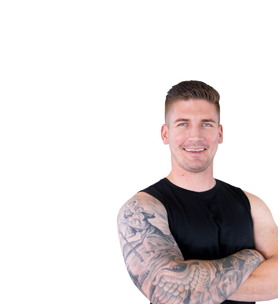 Barry's instructor standing confidently wearing a black top against a white background.