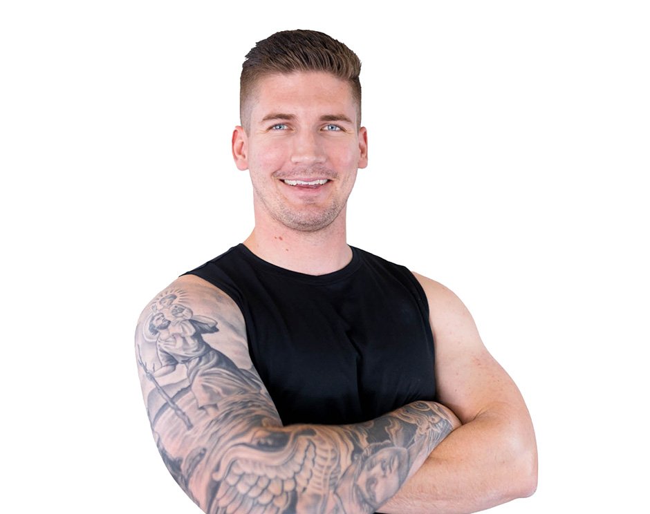 Barry's instructor standing confidently wearing a black top against a white background.