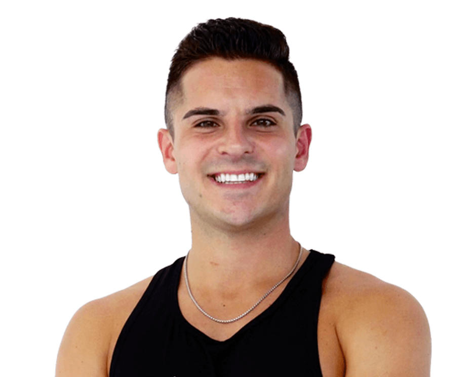 Barry's instructor standing confidently wearing a black top against a white background.