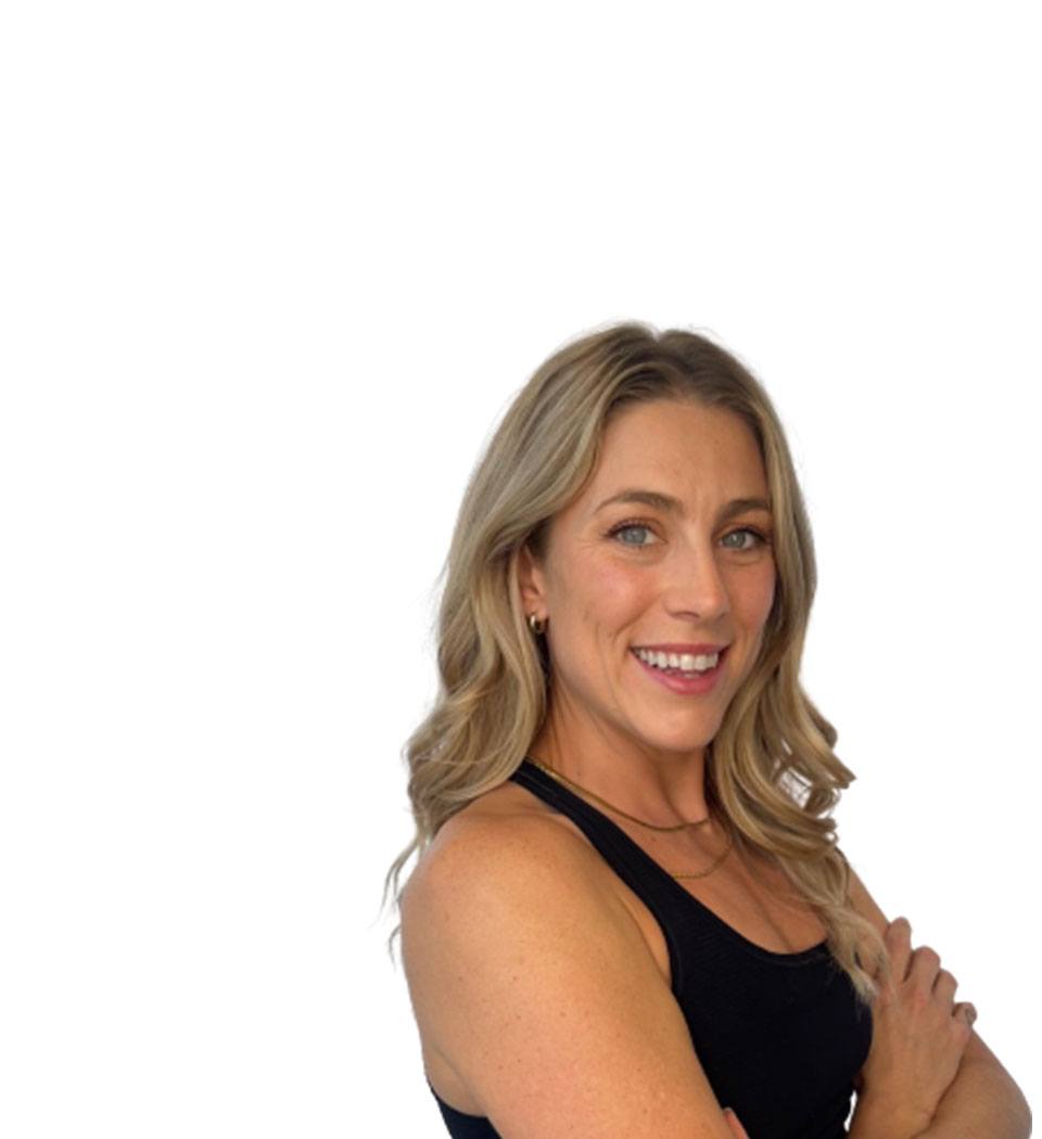 Barry's instructor standing confidently wearing a black top against a white background.