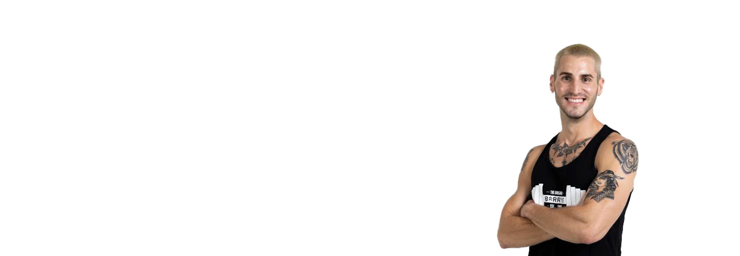 Barry's instructor standing confidently wearing a black top against a white background.