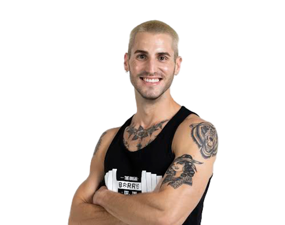 Barry's instructor standing confidently wearing a black top against a white background.