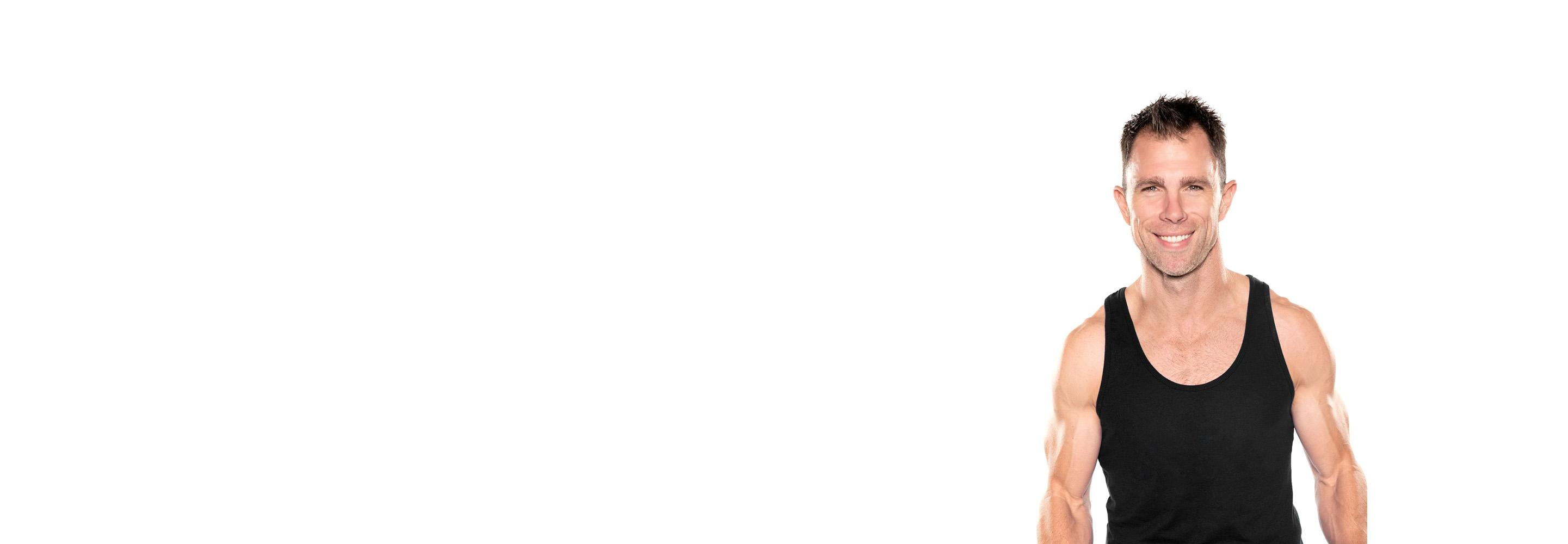 Barry's instructor standing confidently wearing a black top against a white background.