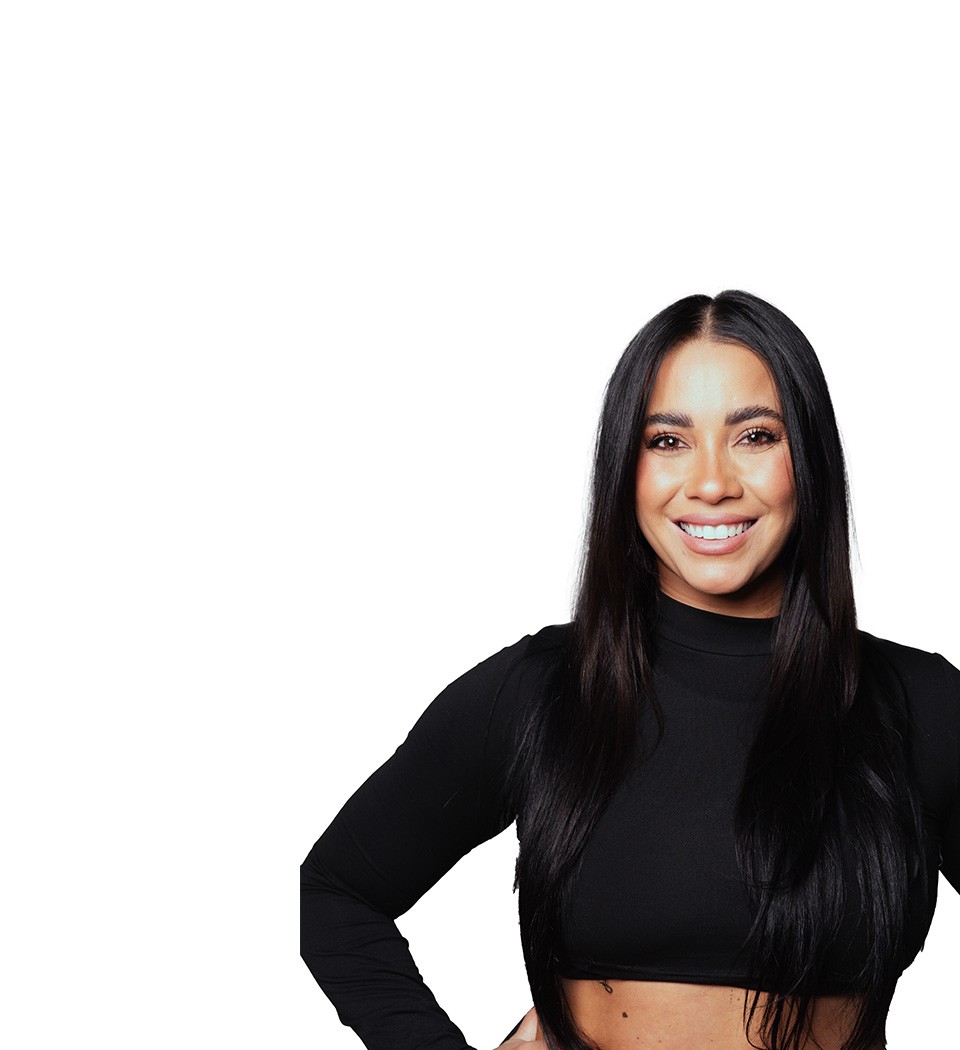 Barry's instructor standing confidently wearing a black top against a white background.