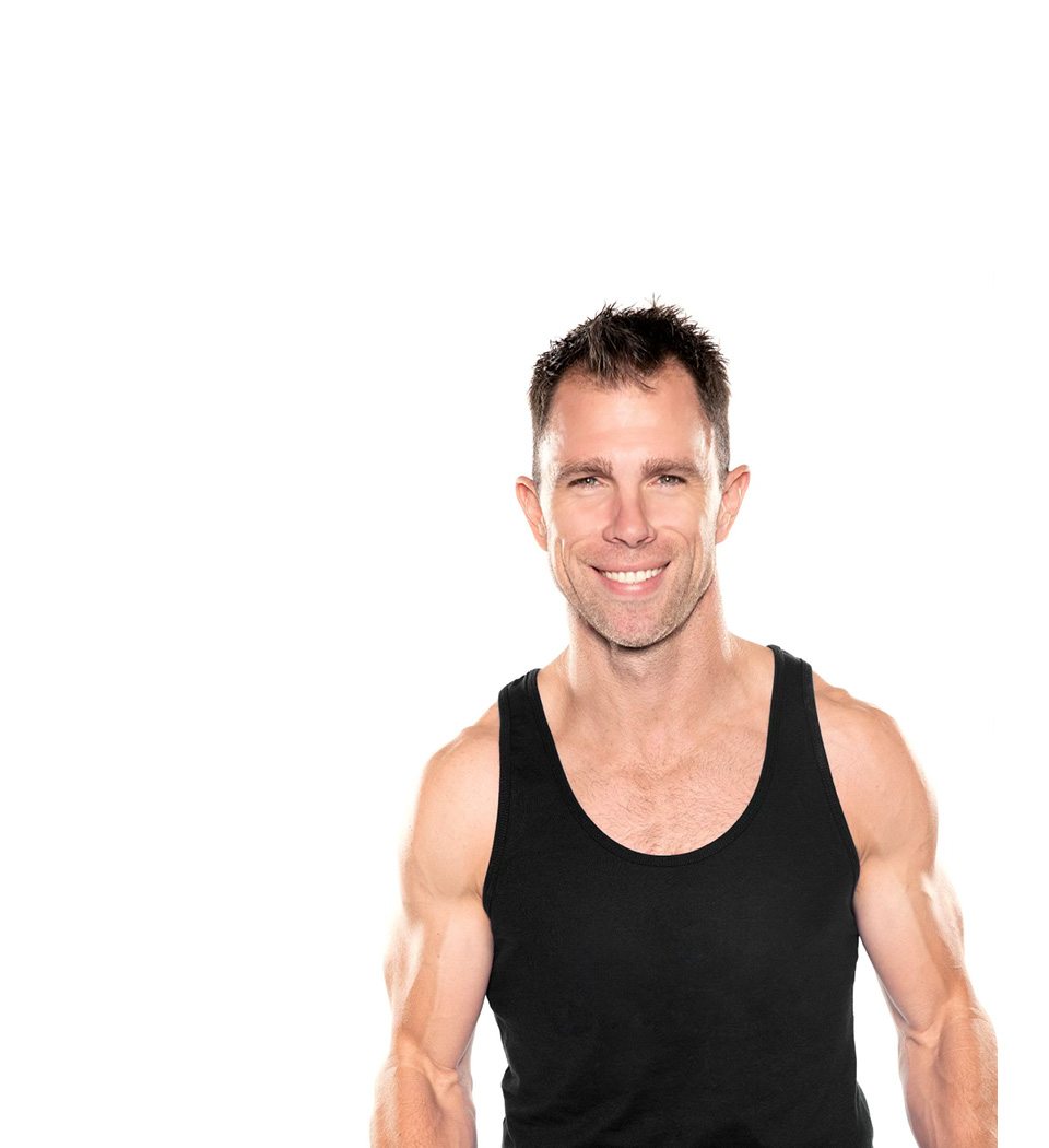 Barry's instructor standing confidently wearing a black top against a white background.