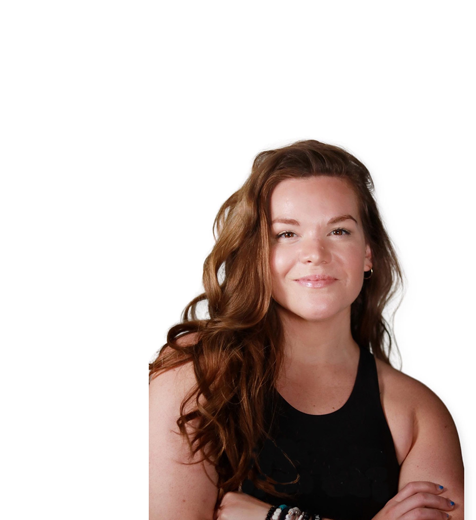 Barry's instructor standing confidently wearing a black top against a white background.