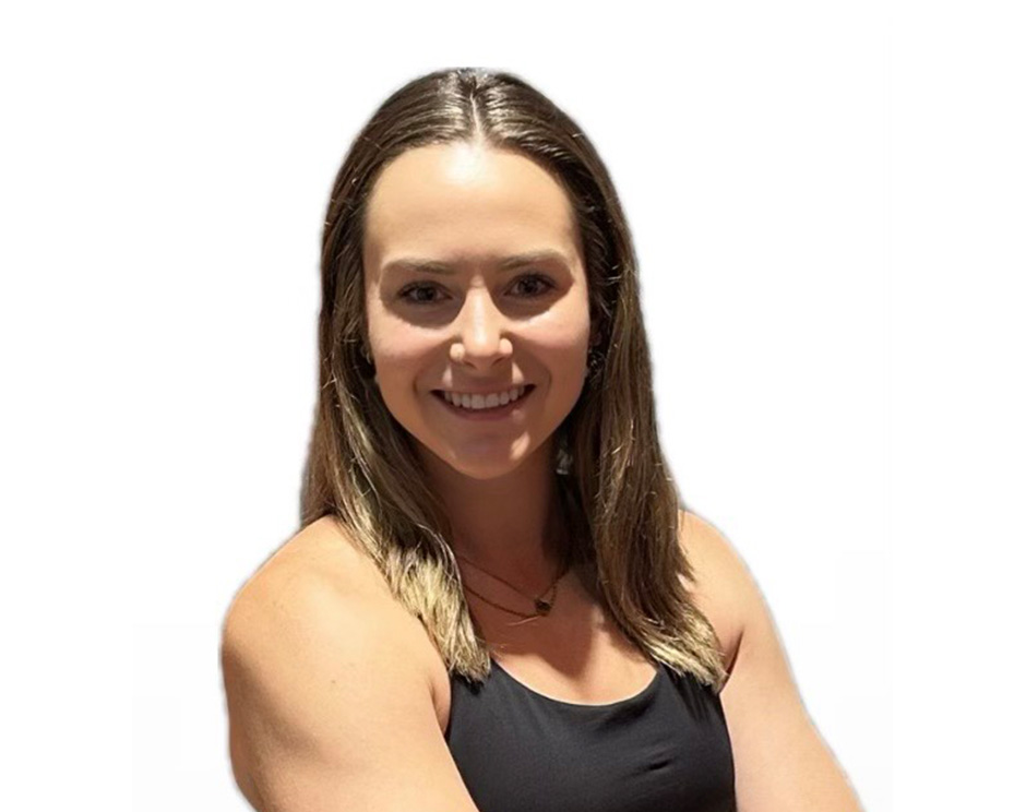 Stephanie C. Barry's instructor standing confidently wearing a black top against a white background.