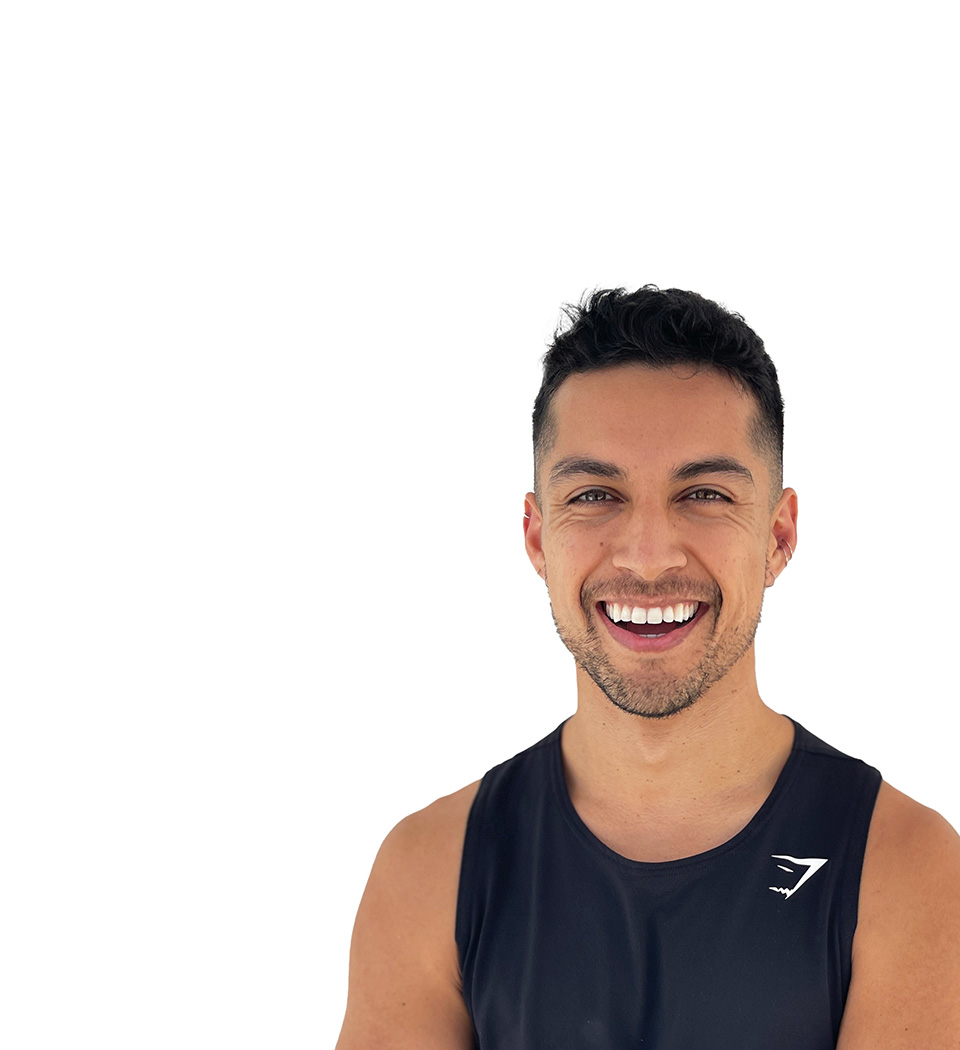 Barry's instructor standing confidently wearing a black top against a white background.