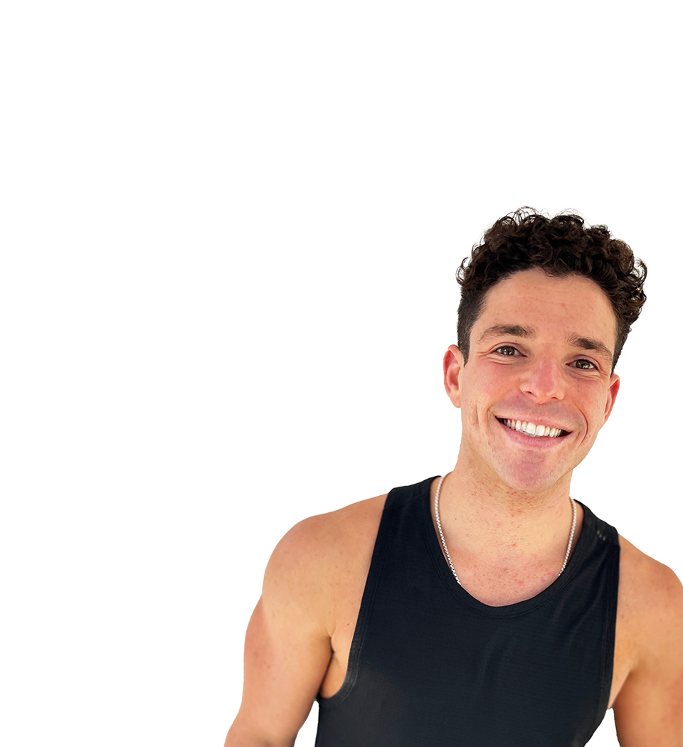 Barry's instructor standing confidently wearing a black top against a white background.