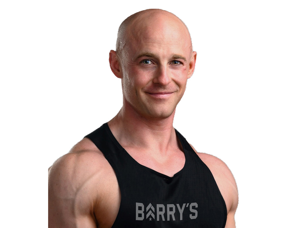 Barry's instructor standing confidently wearing a black top against a white background.