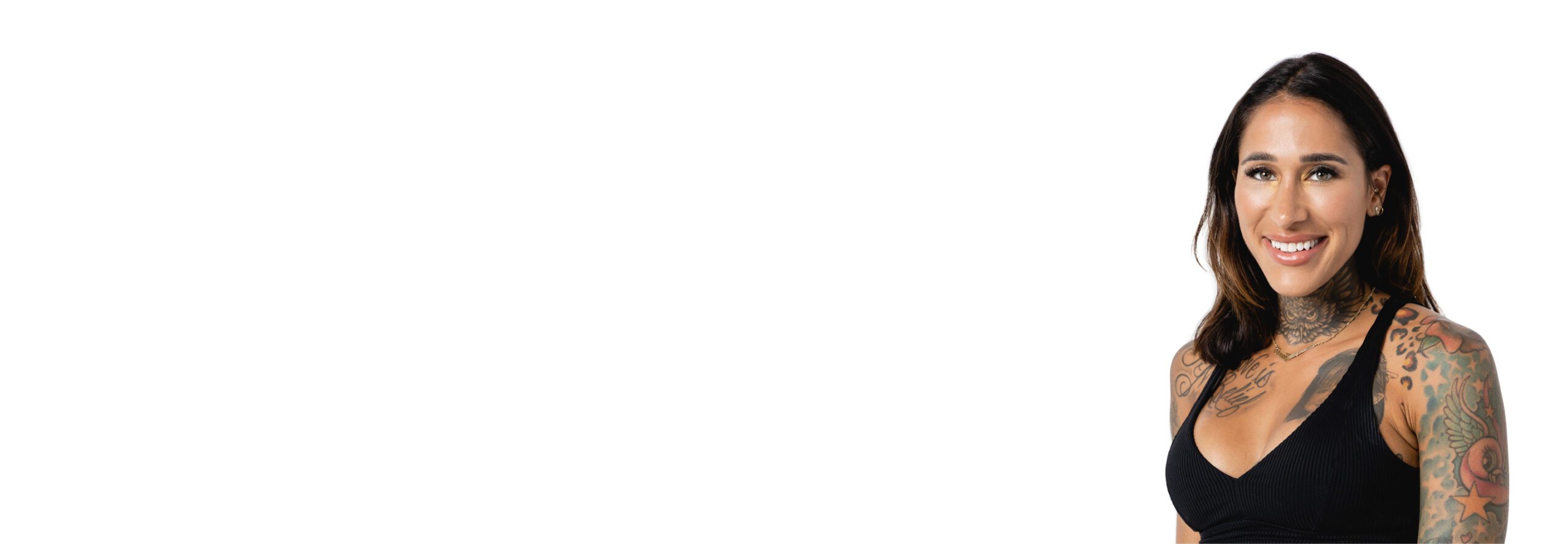 Barry's instructor standing confidently wearing a black top against a white background.