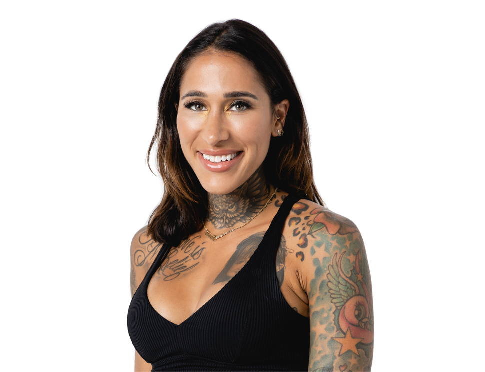 Barry's instructor standing confidently wearing a black top against a white background.