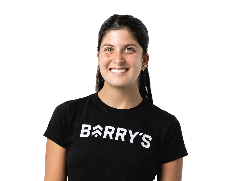 Barry's instructor standing confidently wearing a black top against a white background.