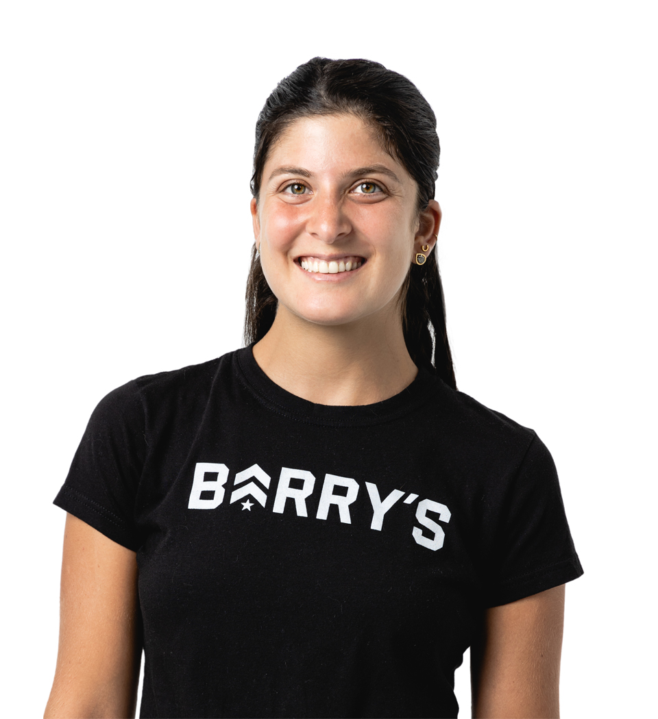 Barry's instructor standing confidently wearing a black top against a white background.