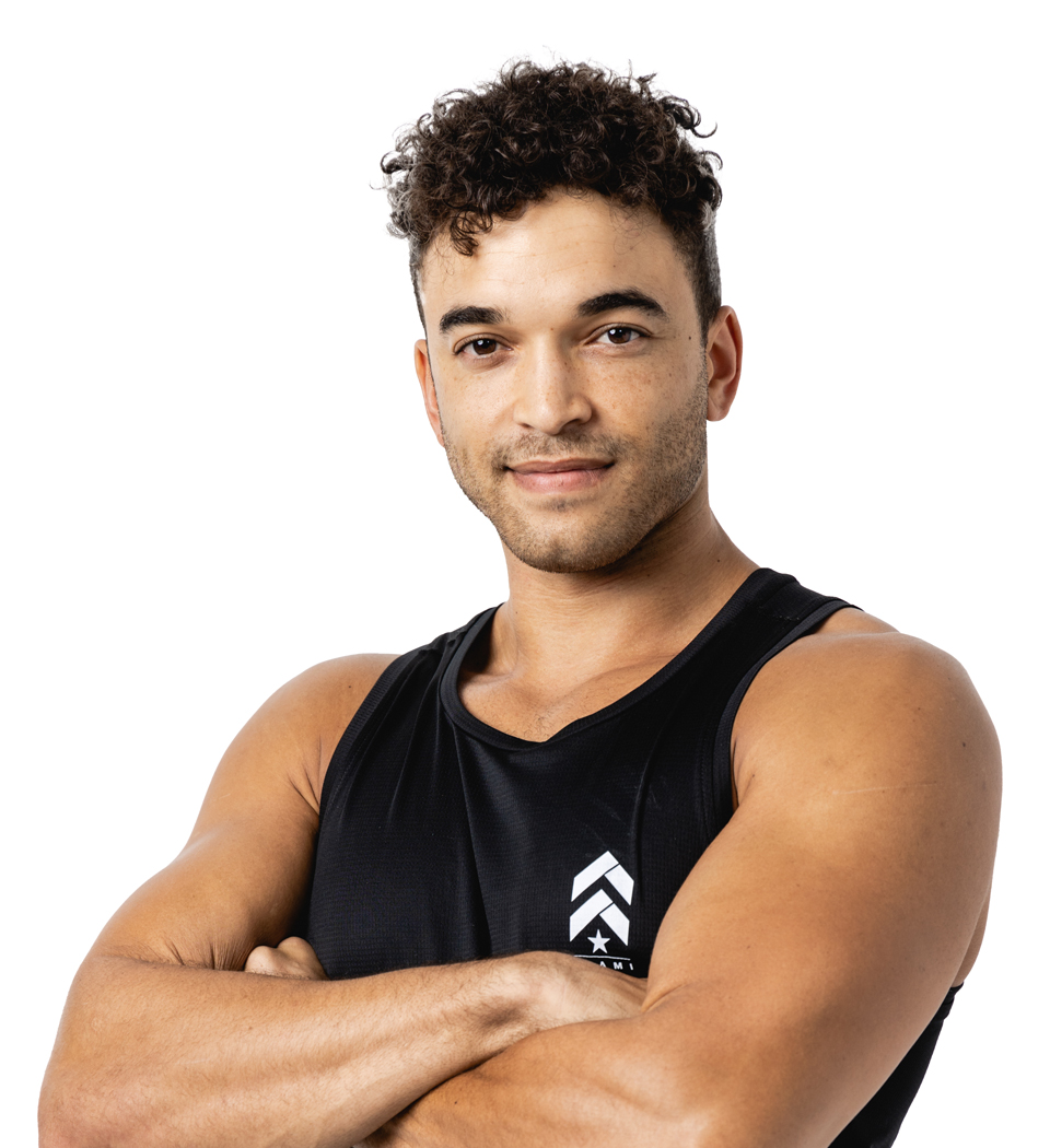 Barry's instructor standing confidently wearing a black top against a white background.